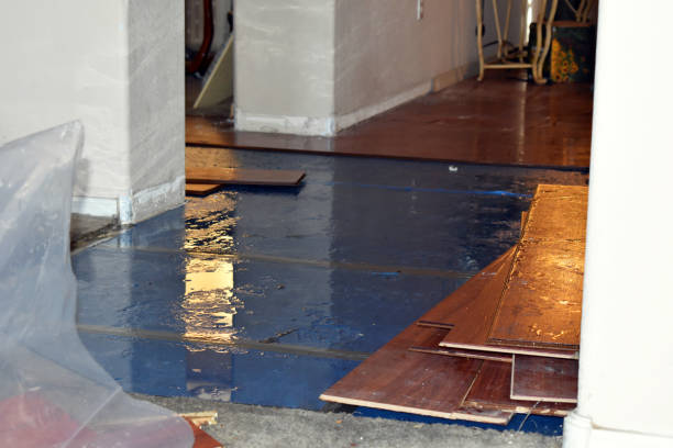 Professional Flood Damage Restoration technician working in Burlington, ME